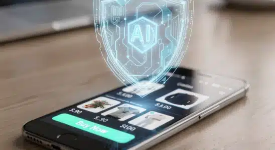 Smartphone displaying cybersecurity shield over an online shopping cart against AI scams